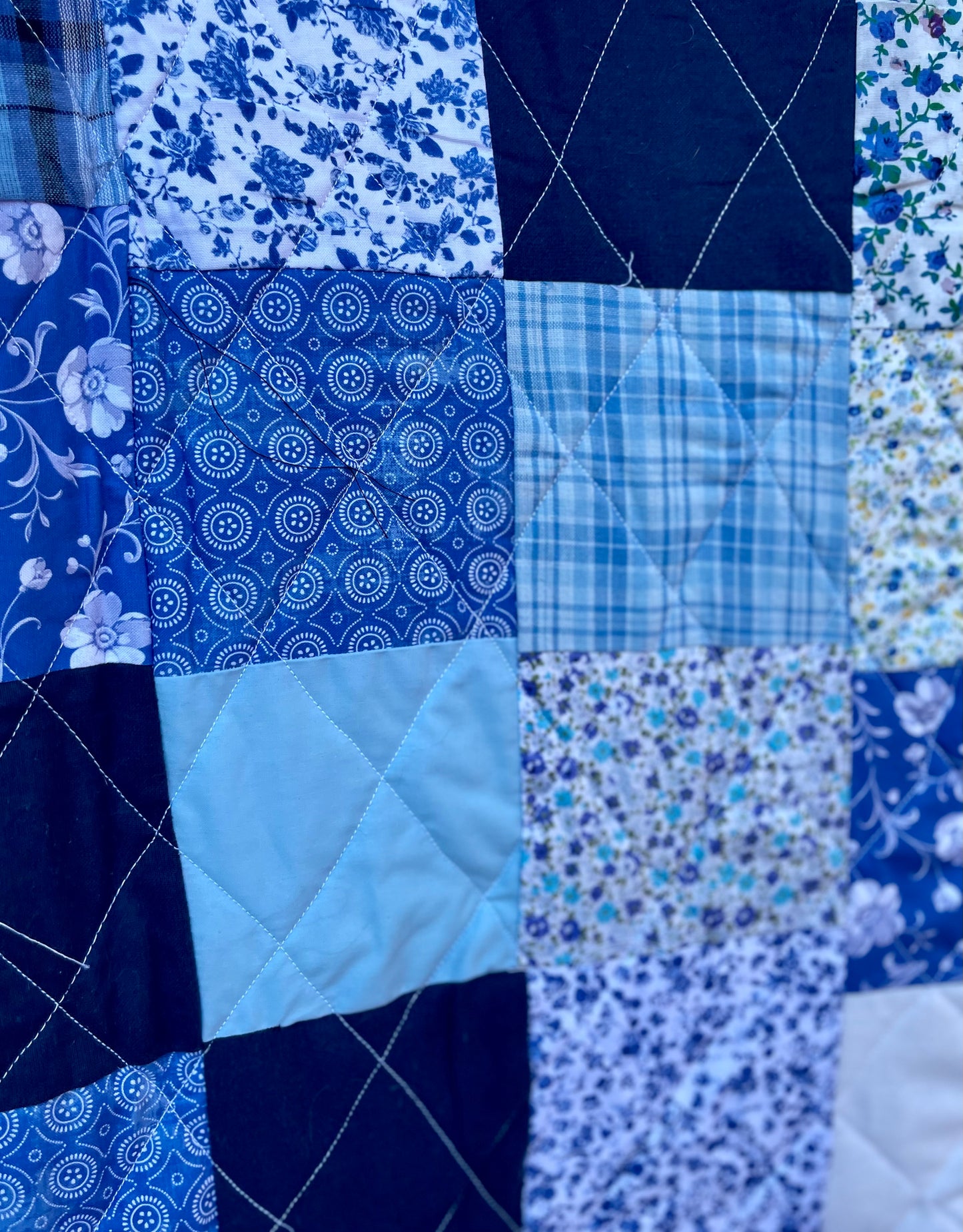 blue patchwork quilt